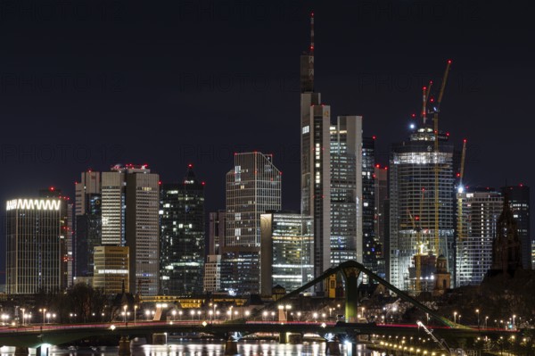 30 hrs and 21:30 hrs, only in greatly reduced form., Deutschherrnbrücke, Frankfurt am Main, Hesse, Germany, On the occasion of Earth Hour 2023, the lights of Frankfurt's banking skyline will shine on the evening of 25 March 2023, between 20, Europe