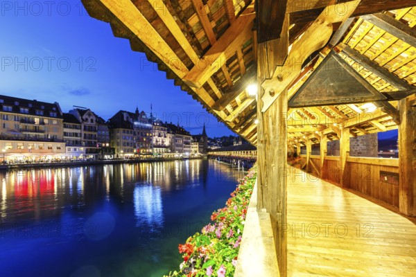 Chapel Bridge town on the river Reuss with bridge at night in Lucerne, Switzerland, Europe