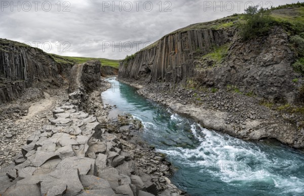 Stuðlagil Canyon, turquoise river between basalt columns, Egilsstadir, Iceland, Europe