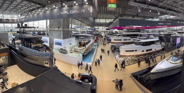 View from elevated position in exhibition overview of exhibition hall public fair fair boot Düsseldorf with luxury yachts superyachts ships boats, Düsseldorf, North Rhine-Westphalia, Germany, Europe