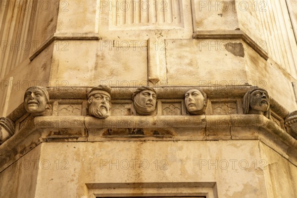 Famous heads on the façade of the Cathedral of St James, UNESCO World Heritage Site in Sibenik, Croatia, Europe