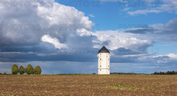 Water tower Crölpa-Löbschütz, field landscape with ploughed field under a stormy sky with dramatic clouds, near Naumburg, Saxony-Anhalt, Germany, Europe