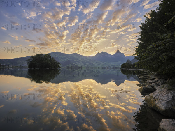 Morning atmosphere at Lake Lauerz with island, Großer and Kleiner Mythen in the background, Lauerz, Canton Schwyz, Switzerland, Europe