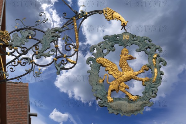 Historic nose sign from around 1900 at the former Gasthof Zum Greifen, Dr.-Martin-Luther-Straße 7, Dinklesbühl, Bavaria, Germany, Europe