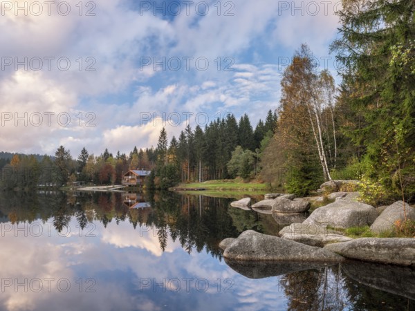 Autumn evening at Lake Fichtelsee, shore with large boulders, Fichtelgebirge, Upper Franconia, Bavaria, Germany, Europe