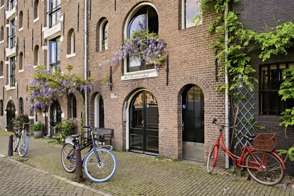 Bicycles in front of the Brouwershof, Amsterdam, Province of North Holland, Netherlands