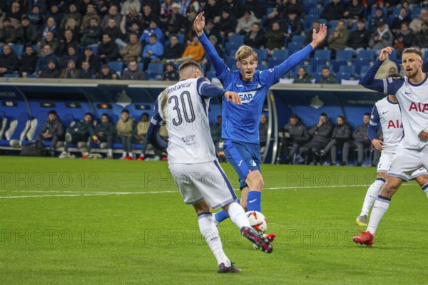 Football UEFA Europa League, 2024/25 season, matchday 7: TSG Hoffenheim v Tottenham Hotspur. Picture: Rodrigo Bentancur (30, Tottenham) and Max Moerstedt (33, Hoffenheim)