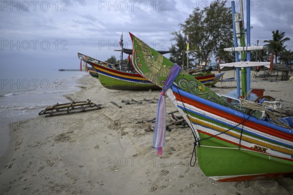 Fishing boats on the beach of Chathing Phra, near Hat Yai, Songkhla province, Thailand, Asia