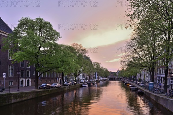 Canal in the evening light after sunset, Amsterdam, North Holland, Netherlands