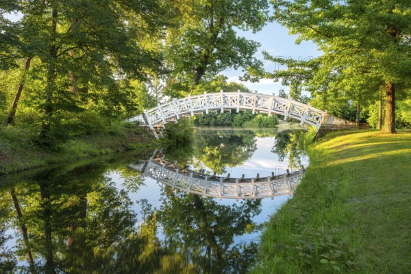 The Chinese or White Bridge in Wörlitz Park in the evening light, Garden Kingdom Dessau-Wörlitz, Wörlitz, Saxony-Anhalt Germany