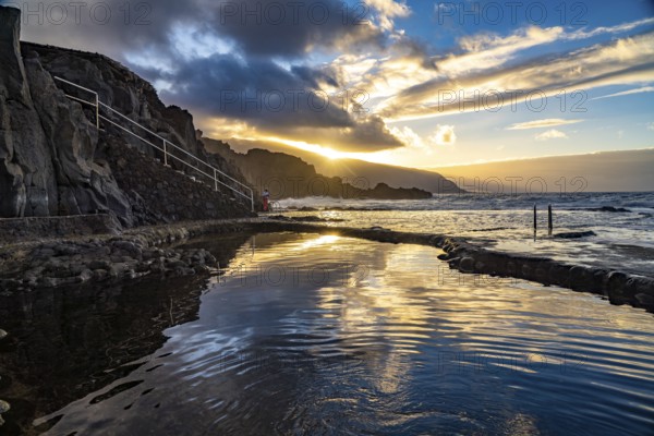 Sunset at the natural swimming pool La Maceta, El Hierro, Canary Islands, Spain, Europe