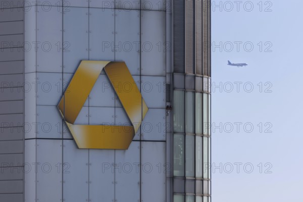 An aeroplane flies past behind the Commerzbank Tower in Frankfurt am Main, Frankfurt am Main, Hesse, Germany, Europe