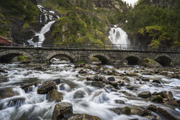 Låtefossen waterfall with bridge, Latefossen, Odda, Vestland, Norway, Europe