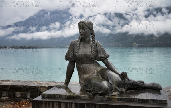 Figure, monument in memory of the poet Albert Streich, 1897-1960, lakeside promenade on Lake Brienz, Brienz, Canton Bern, Bernese Oberland, Switzerland, Europe