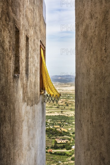 Typical narrow alley with view of the surrounding countryside from above, old town of Mojácar, Almería, Andalusia, Spain, Europe