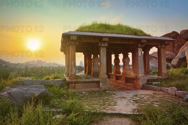 Ancient ruins in Hampi on sunset. Above Hampi Bazaar, Hampi, Karnataka, India, Asia