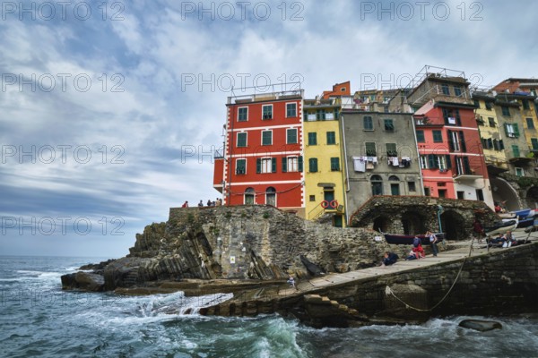 RIOMAGGIORE, ITALY, APRIL 25, 2019: Riomaggiore village popular tourist destination in Cinque Terre National Park a UNESCO World Heritage Site, Liguria, Italy in stormy weather