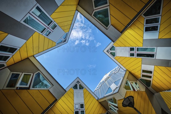 ROTTERDAM, NETHERLANDS, MAY 11, 2017: Cube houses, innovative cube-shaped houses designed by architect Piet Blom with idea to optimize space in Rotterdam, Netherlands now became a tourist attraction