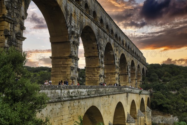 Pont du Gard, Roman aqueduct over the river Gardon, evening sky, Languedoc-Roussillon, South of France, France, Europe