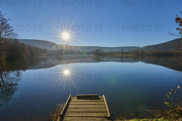 Lake with jetty at sunrise, Freudenberg am Main, Untermain, Spessart, Odenwald, Franconia, Baden-Württemberg, Germany, Europe