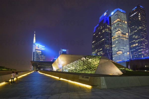 GUANGZHOU, CHINA, APRIL 27, 2018: Guangzhou Opera House designed by famous Iraqi architect architect Zaha Hadid illluminated at night