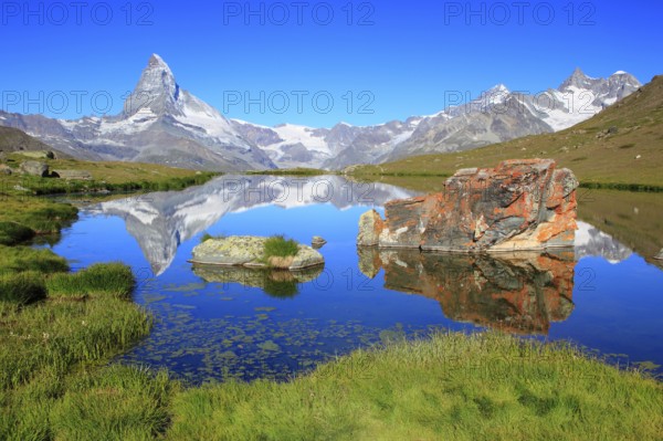 Matterhorn and mountain lake, Stellisee, Valais, Switzerland, Europe
