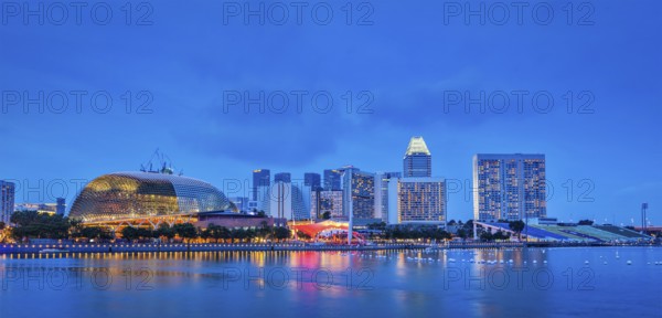 Singapore skyline panorama at Marina Bay in the evening