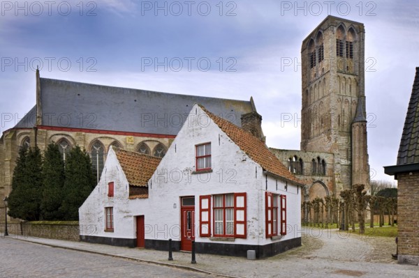 Old White House and the Church of Our Lady, Onze-Lieve-Vrouwekerk in the small town of Damme, West Flanders, Belgium, Europe
