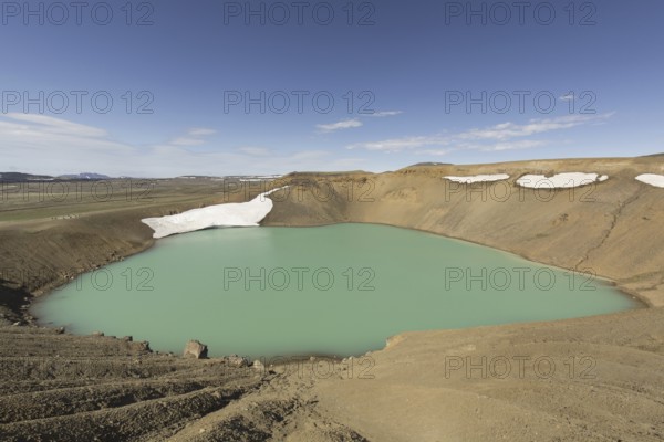 Lake Myvatn inside crater Víti, part of Krafla, volcanic caldera in the Myvatn Geothermal Area in summer, North Iceland