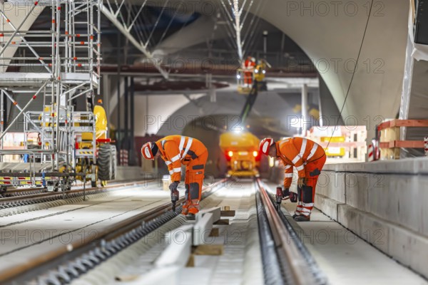 The last rails are being welded at the new main station. All the rails are now in place between Feuerbach and Wendlingen. The last gaps between the rails have been closed using the Thermit welding process. The infrastructure project is scheduled to go online at the end of 2026. Deutsche Bahn estimates the total cost of Stuttgart 21 at around eleven billion euros. Stuttgart, Baden-Württemberg, Germany, Europe