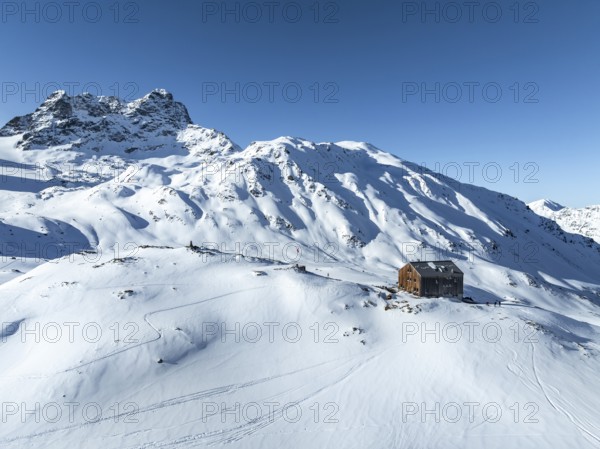 Alpine panorama, aerial view with Kesch hut, Alpine Club hut of the SAC in winter, Albula Alps, Grisons, Switzerland, Europe