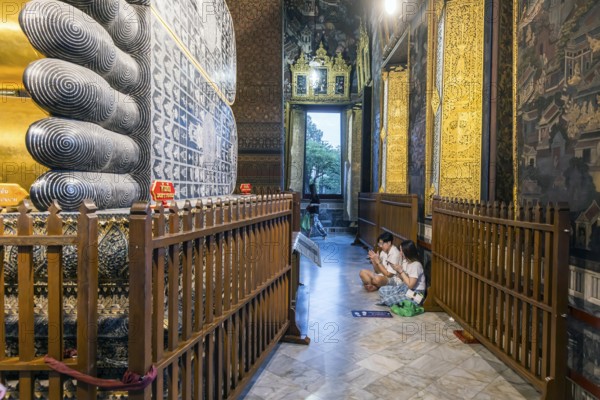 Wat Pho, temple of the reclining Buddha. Sightseeing attraction, architecturally significant temple complex. It is home to Phra Buddhasaiyas. The gilded Buddha statue is 46 metres long and 15 metres high. Bangkok, Thailand, Asia