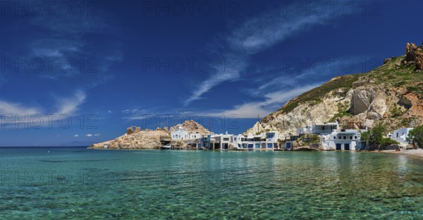 Panorama of the beach and fishing village of Firapotamos in Milos island, Greece, Europe