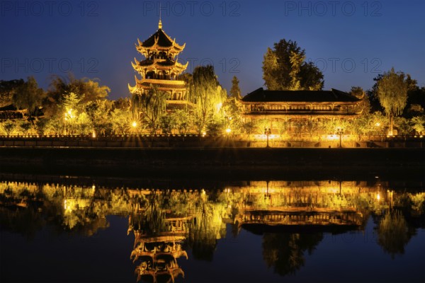 Wangjiang Pavilion Park (Wangjianglou Park) view over Jinjiang River, Chengdu, Sichuan, China illuminated at night