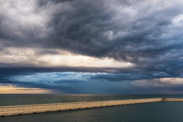 Dramatic sky and clouds during a storm over Mediterranean Sea, Valencia, Spain, Europe