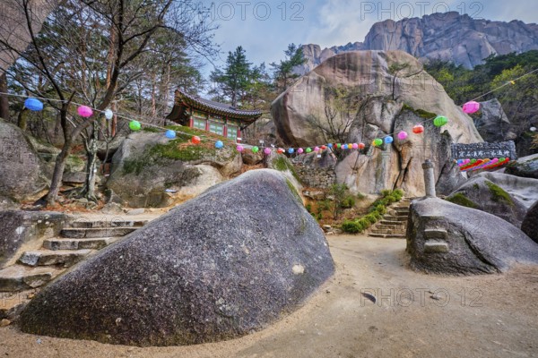 SEORAKSAN, SOUTH KOREA, APRIL 14, 2017: Kyejoam Seokgul Hermitage shrine and Ulsanbawi rock in Seoroksan National park, South Korea, Asia
