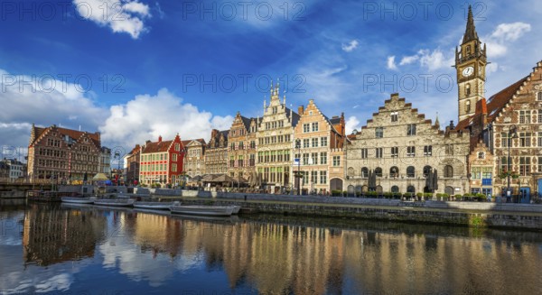 Europe Belgium medieval town travel background, panorama of Ghent canal and Graslei street on sunset. Ghent, Belgium, Europe