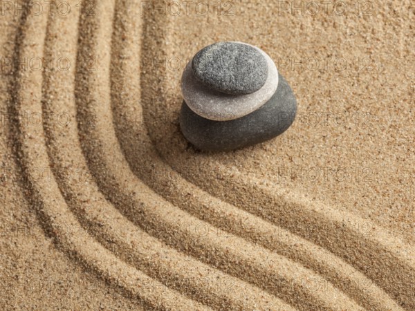 Japanese Zen stone garden, relaxation, meditation, simplicity and balance concept, pebbles and raked sand tranquil calm scene