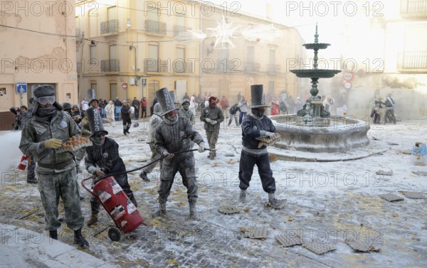 Els Enfarinats flour fight, rebels, armed with flour, eggs and firecrackers, take over the regiment of the city for one day, Plaza de la Iglesia, Ibi, Province of Alicante, Costa Blanca, Spain, Europe