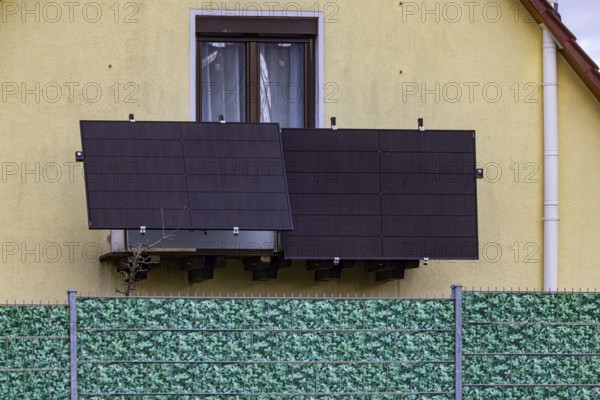 Plastic fence in leaf look on a detached house. Balcony power station. Stuttgart, Baden-Württemberg, Germany, Europe