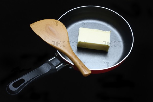 A knob of butter in a pan