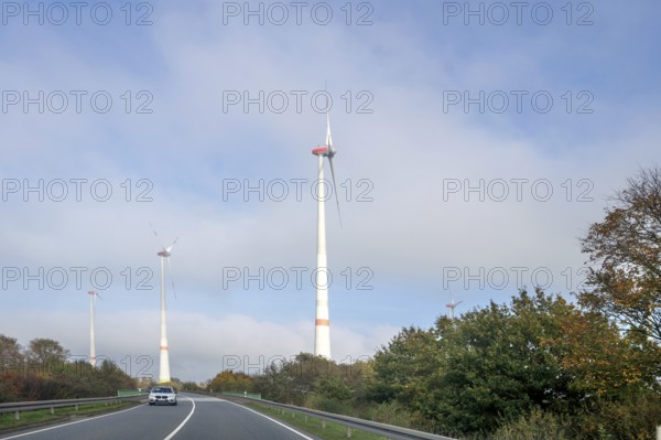 Wind turbines on your main road, Mecklenburg-Western Pomerania, Germany, Europe