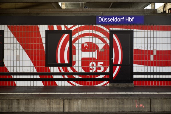 Large logo in club colours of Fortuna Düsseldorf on a wall with tiles, Düsseldorf Central Station, North Rhine-Westphalia, Germany, Europe