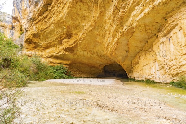 Beautiful cave path of the Vero River walkways in Alquezar. Huesca Pyrenees