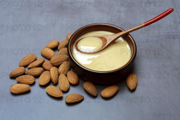 White almond cream in small bowls, almond butter