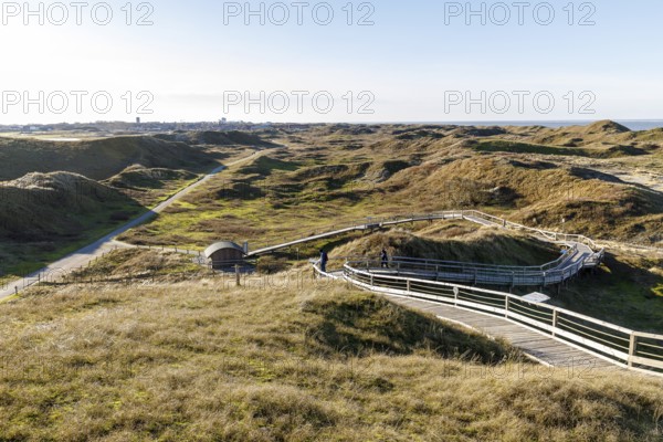 Handicapped-accessible boardwalk to the viewing dune, dune landscape in the national park, the town of Norderney in the background, Lower Saxony, Germany, Europe