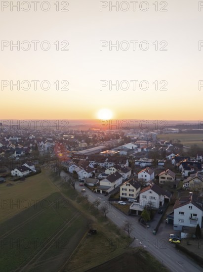 Aerial view of a village with houses and fields at sunset, peaceful atmosphere, Althengstett, district of Calw, Germany, Europe