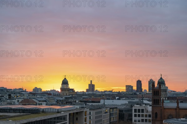 City view at sunset, Friedrichswerder Church, behind German Cathedral and French Cathedral, view from the roof terrace of the Humboldt Forum, Mitte, Berlin, Germany, Europe