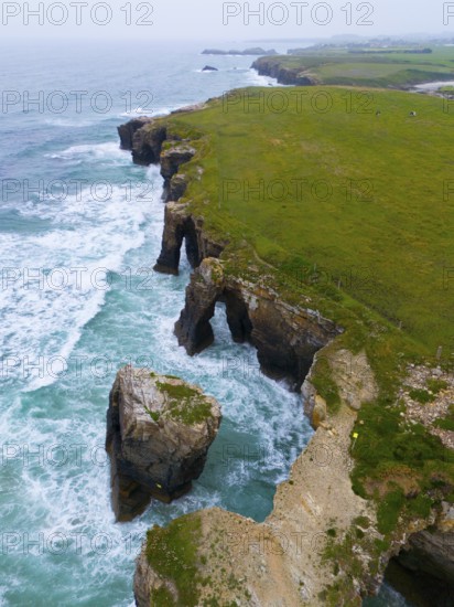 Impressive view of steep cliffs with unique rock formations and a lush green landscape, aerial view, Praia das Catedrais, Playa de las Catedrales, Cathedral beach, As Catedrais beach, Cantabrian Sea, Ribadeo, Galicia, Galicia, Spain, Europe