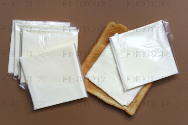 Cheese slices with toast, processed cheese in packaging